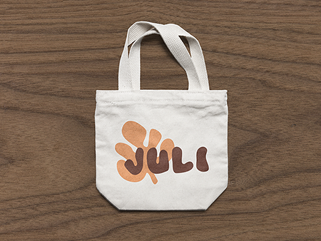 tote bag with a logo on it that says 'juli'